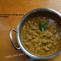 Bittergourd in spicy, tangy gravy (Pavakkai gojju)- Meatless Monday